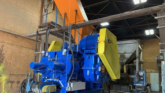 Freshly painted machine in a pole building