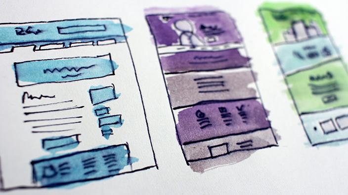Watercolor and illustration of website wireframes. 