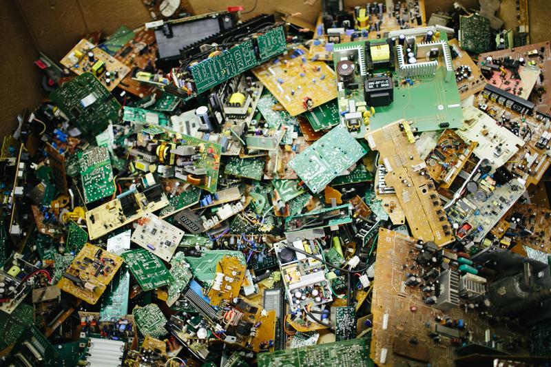 Electronic waste in a pile.