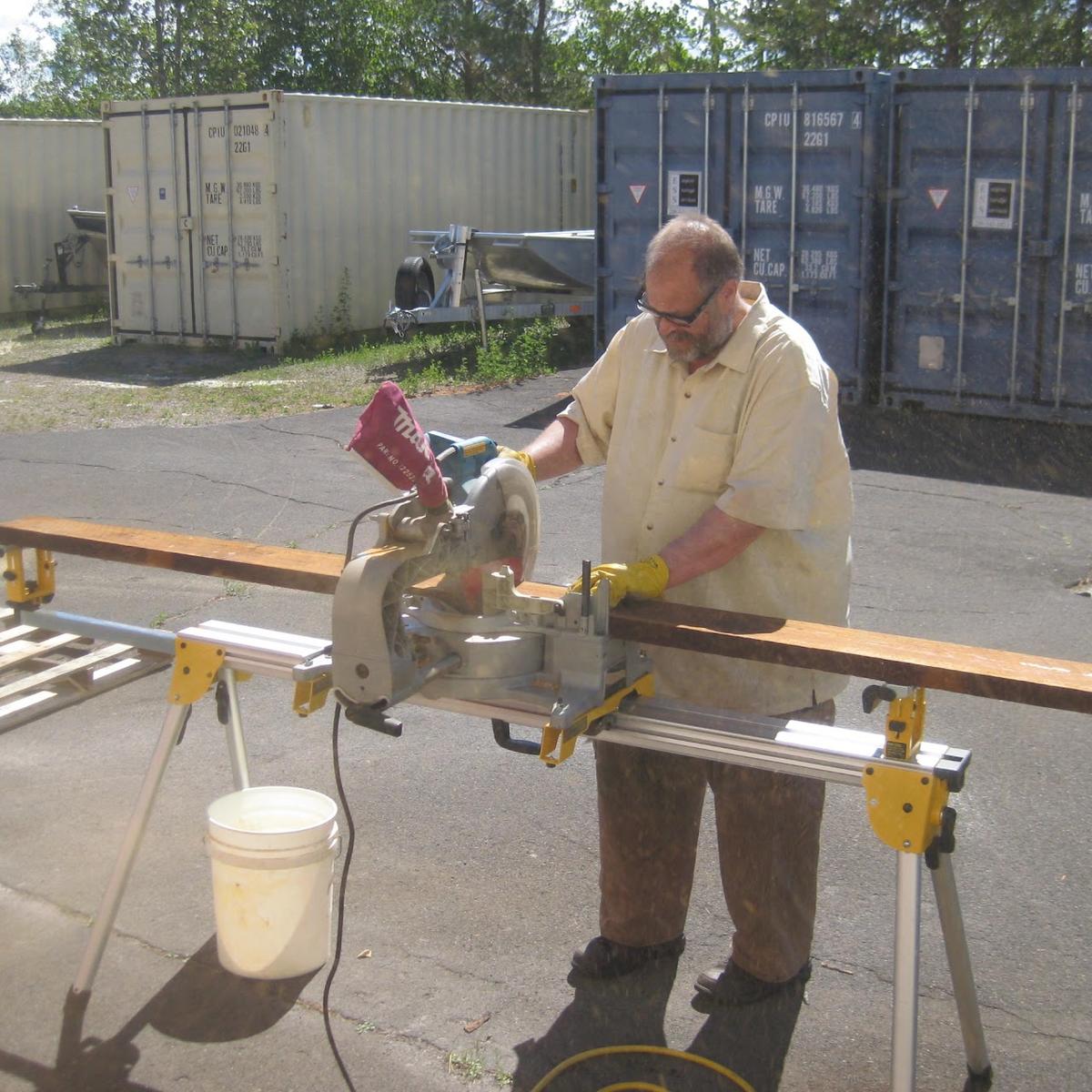 Man cutting board with radial saw